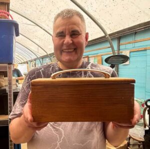 Photo of Stephen with his handmade, wooden box