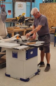 Photo: Woody on the table saw