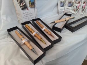 A selection of four pens, ready for sale